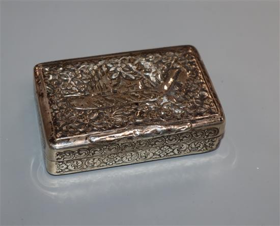 An early 20th century? Persian white metal snuff box, embossed with boat, elephants and scrolling foliage, 79mm.